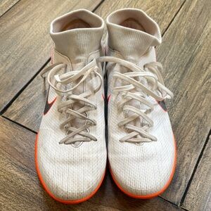 Nike Cream and Orange soccer shoes